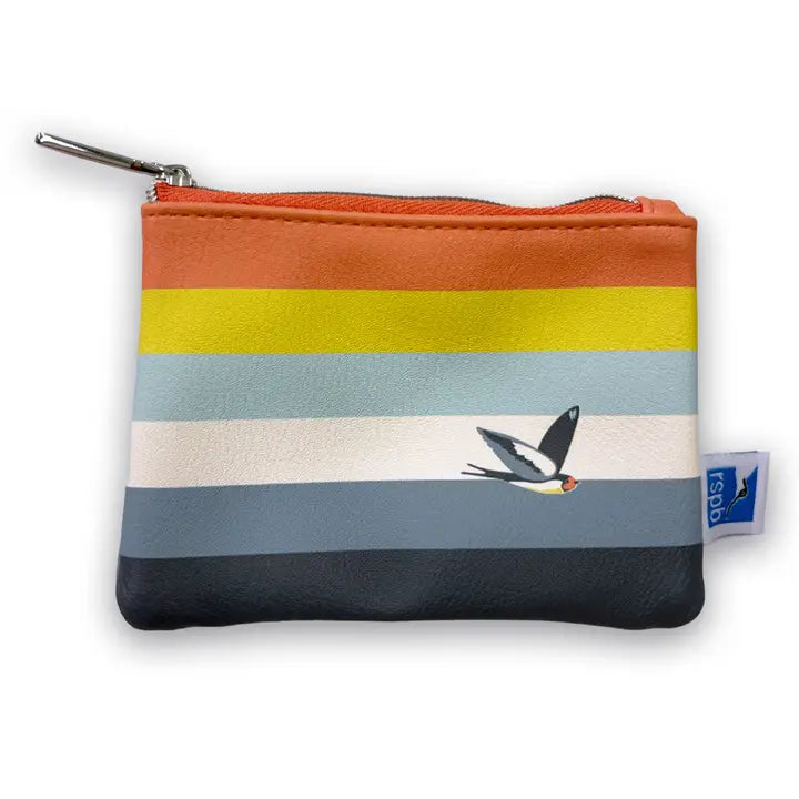 The Zip Coin Purse Swallow Bird is a small, zippered pouch with horizontal stripes in orange, yellow, blue, and white tones. It features a charming flying swallow illustration and a blue tag on the right side—perfect for nature accessory enthusiasts.