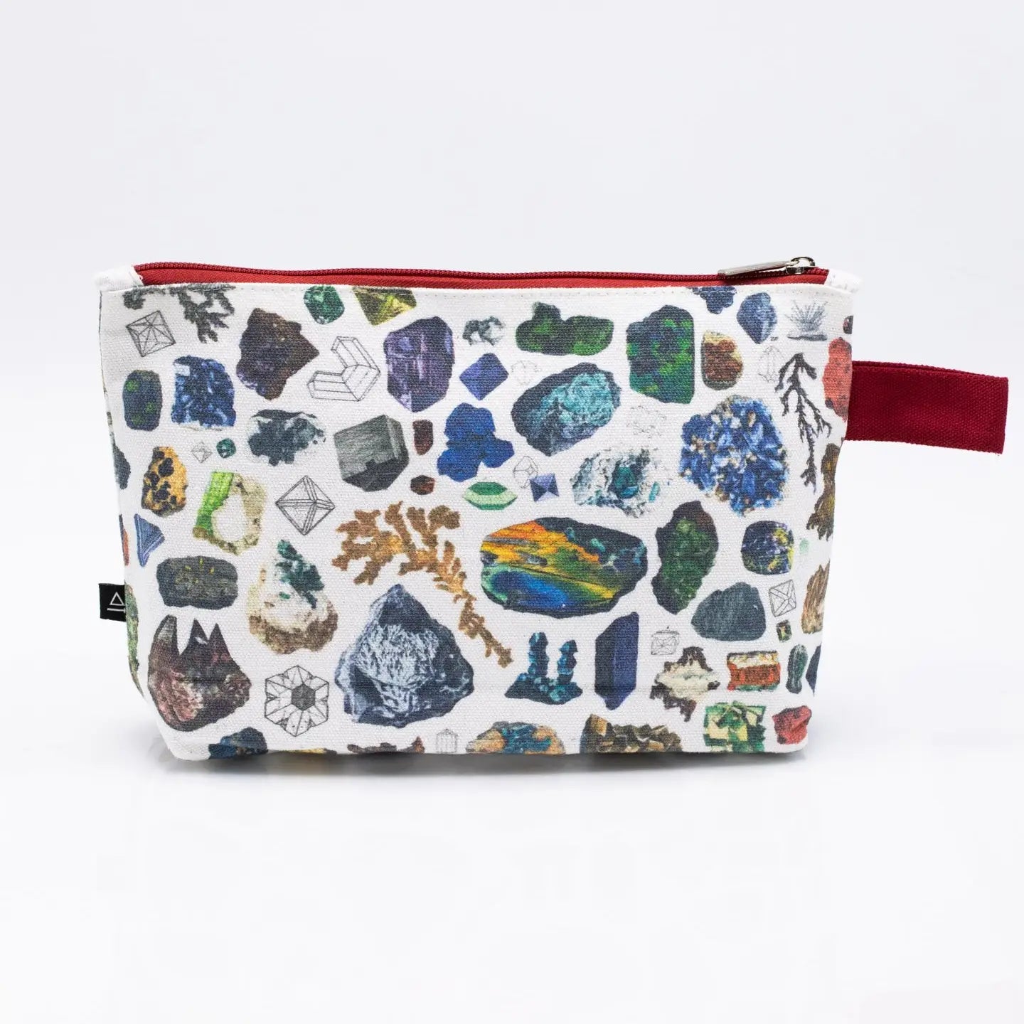 Introducing the Gems & Minerals Pencil Bag: a white zippered pouch featuring a red handle and adorned with vibrant illustrations of assorted rocks, minerals, and crystals.