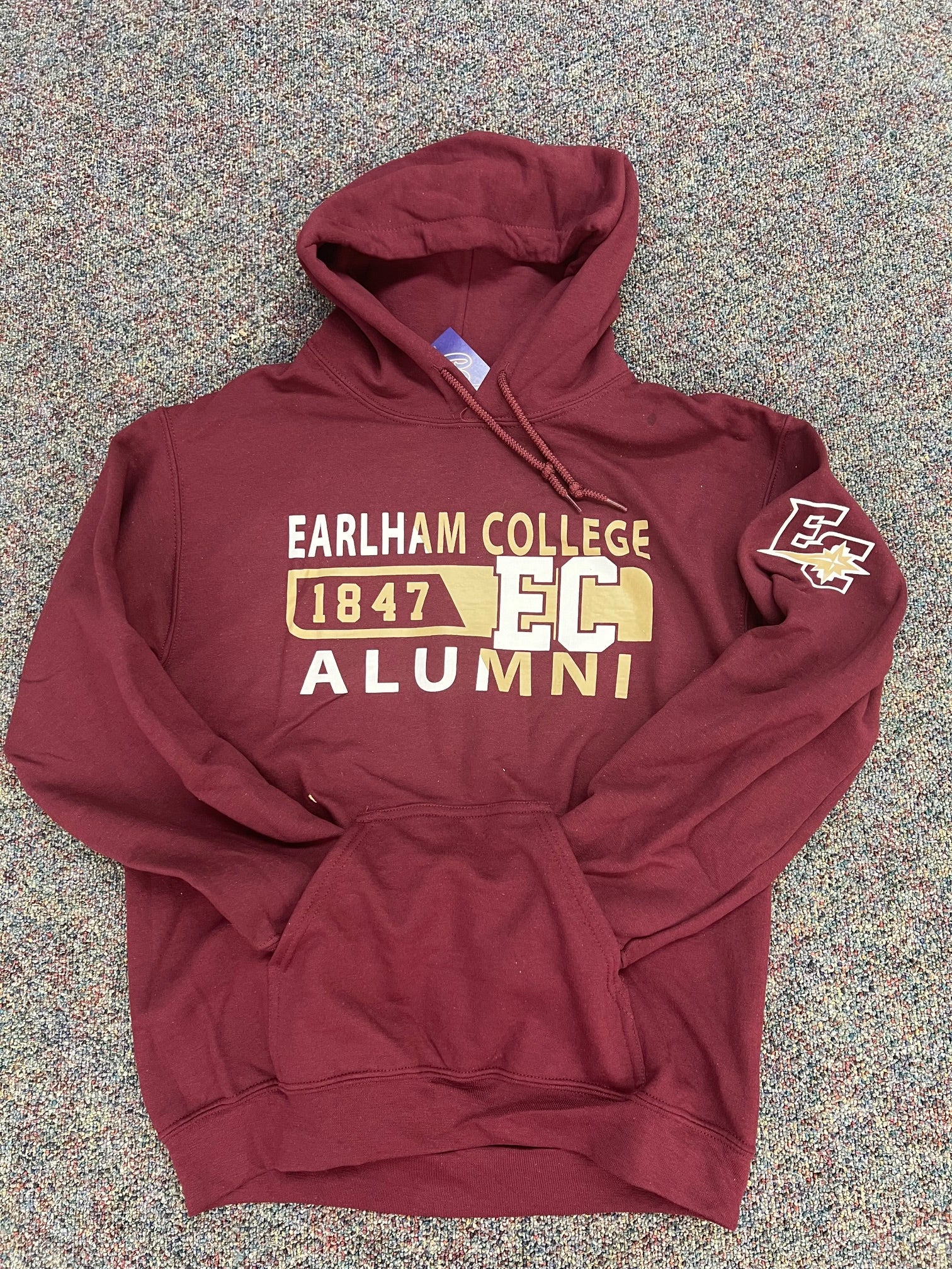 Burgundy hoodie with text that reads "Earlham College; 1847; Alumni" with the Earlham logo on the left sleeve.