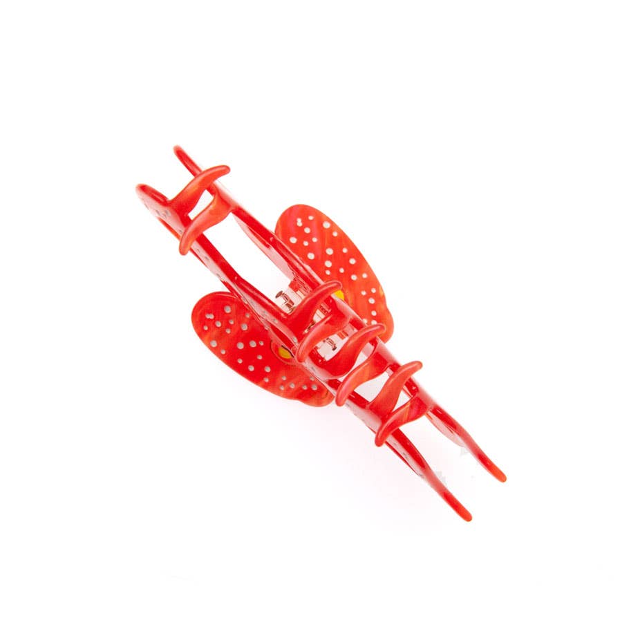 Red translucent cellulose acetate Octopus Claw Clip with strawberry patterns.