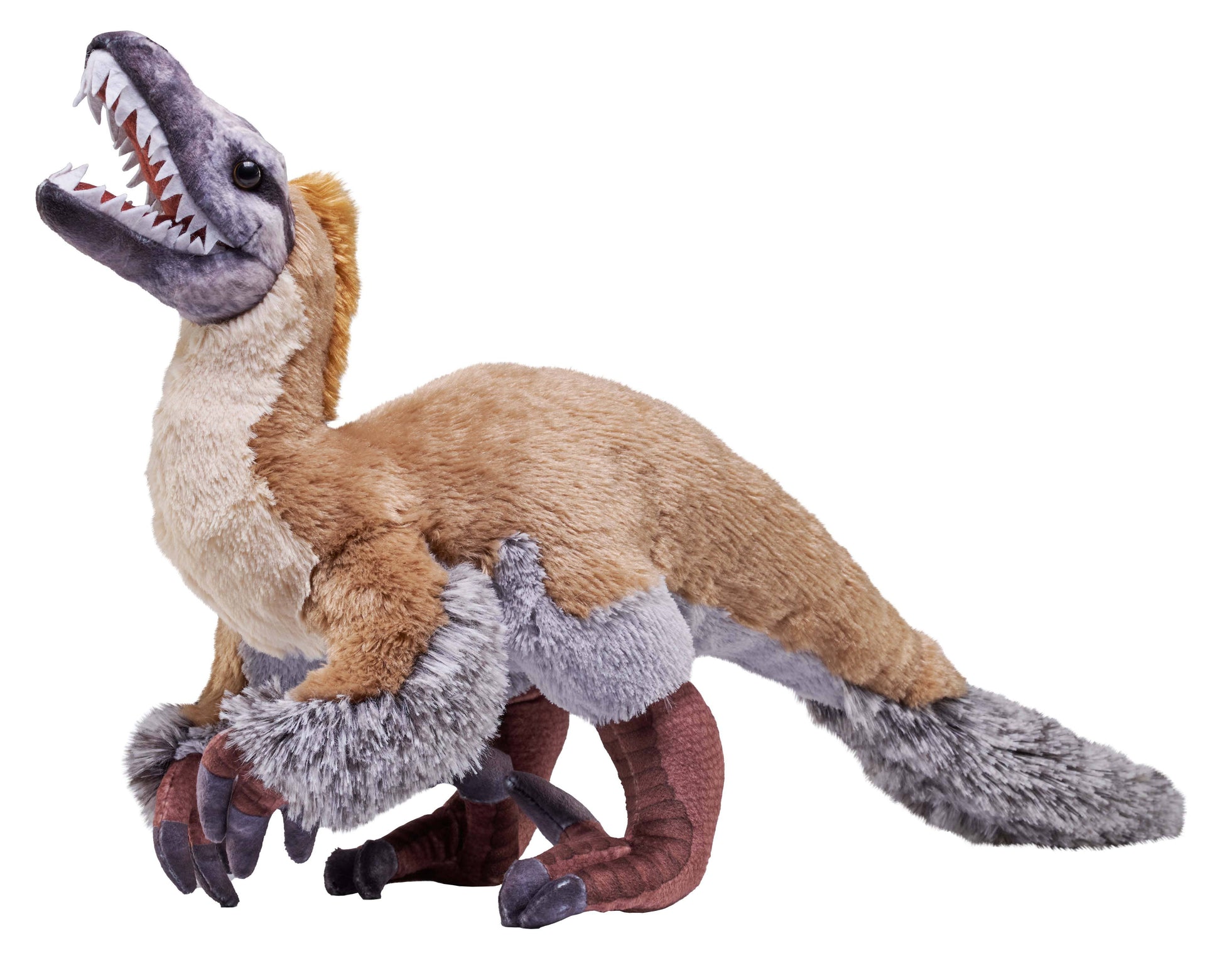 An Artist-Dino Velociraptor Stuffed Animal 15", this realistic plush toy features brown, gray, and tan fur with feather-like details, sharp white teeth, clawed feet, and a bushy tail, posed on all fours against a white background.