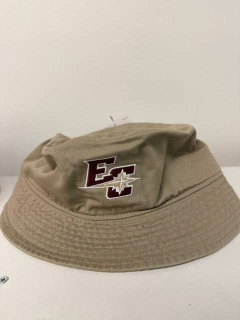 A Nike Bucket Hat in beige, showcasing an embroidered maroon E and C with a white maple leaf on the front, displayed against a plain white background.