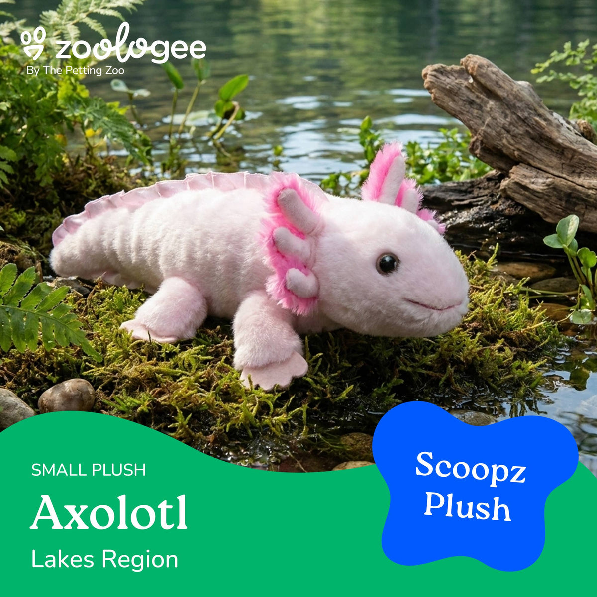 A whimsical Scoopz Axolotl Small 8″ (24cm) plush toy, featuring soft pink fur and feathery gills, rests on moss by a lakeside amidst rocks and lush greenery. This adorable Zoologee stuffed animal brings charm to the Axolotl Lakes Region. Text reads: Scoopz Axolotl Small 8″, Scoopz Plush, Zoologee.
