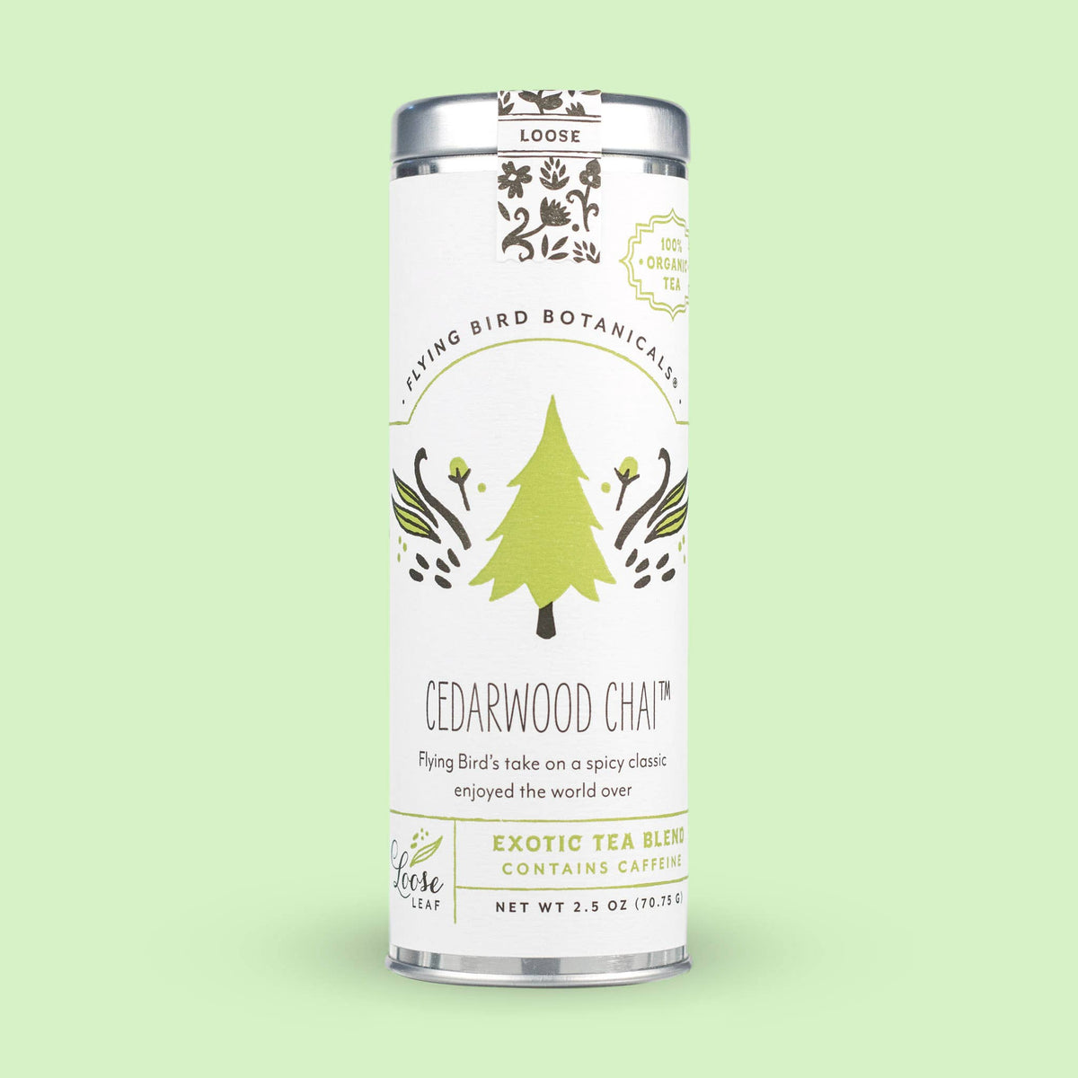 A tall, cylindrical metal tin of Cedarwood Chai (ORG) – Loose Leaf Tin featuring a white label with a green tree illustration.