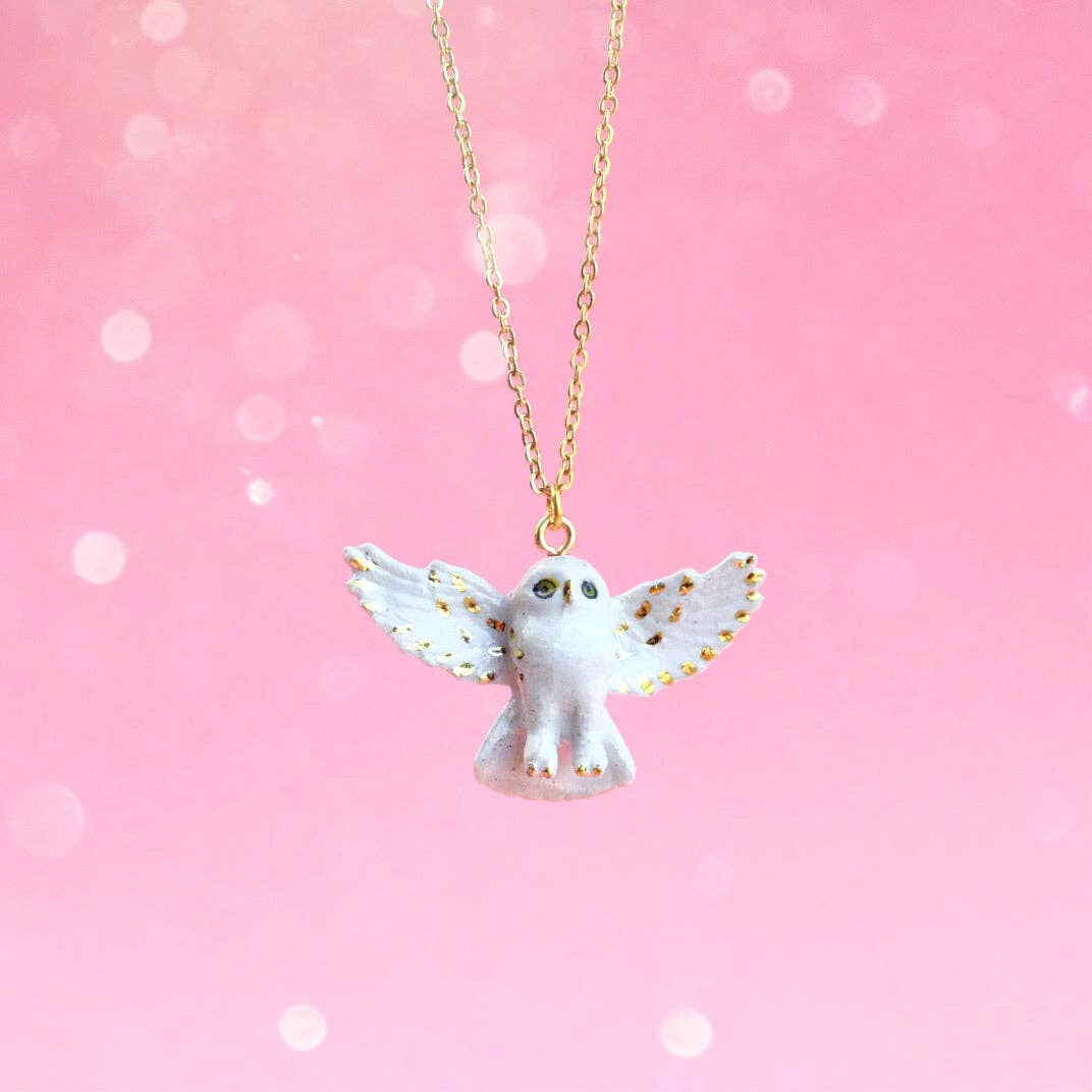 Gold and White Snowy Owl