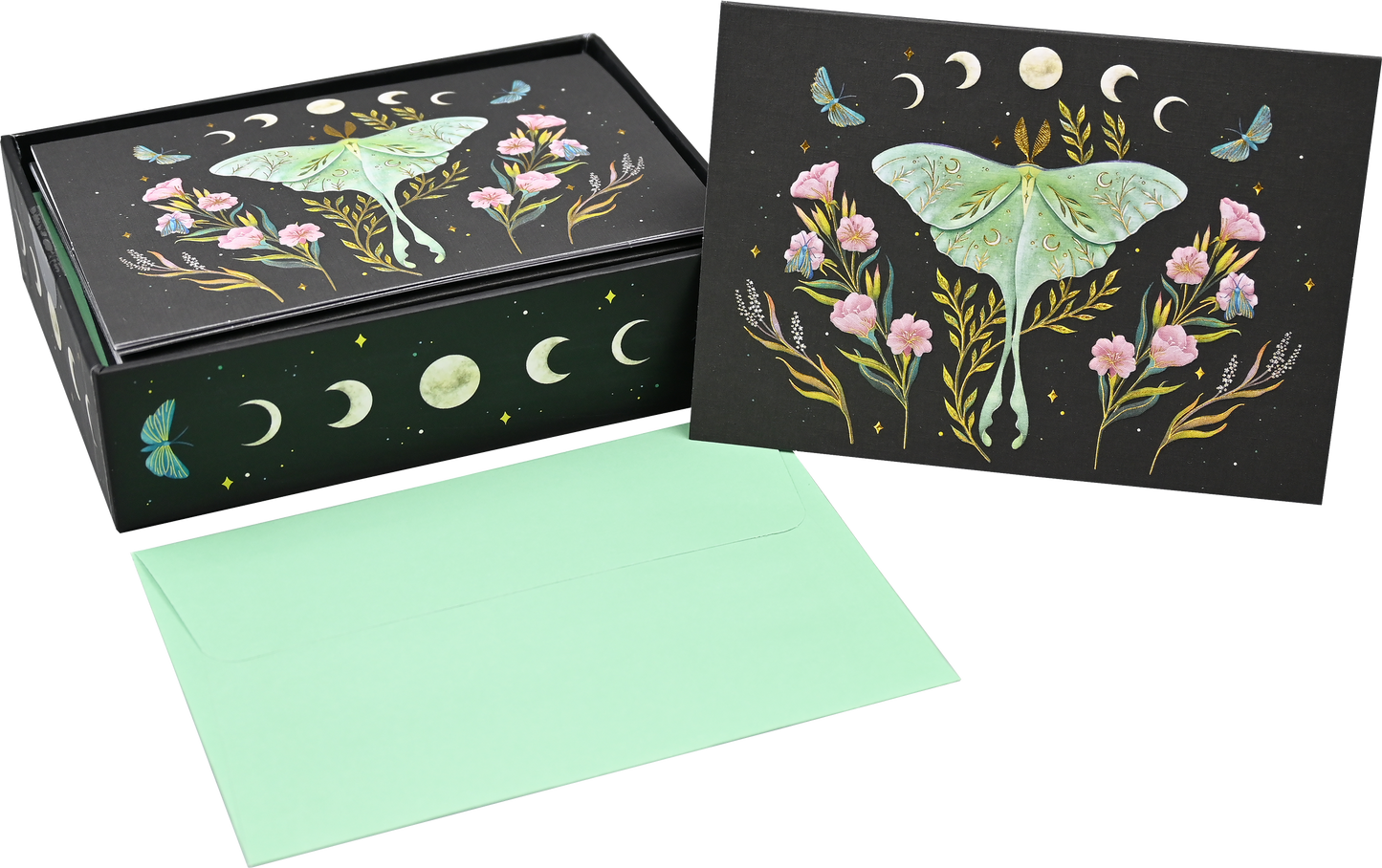 The Luna Moth Note Cards come in a deluxe stationery set with gold foil, pink flowers, butterflies, moon phases, a mint green envelope, and a decorative box—all arranged on a white background.