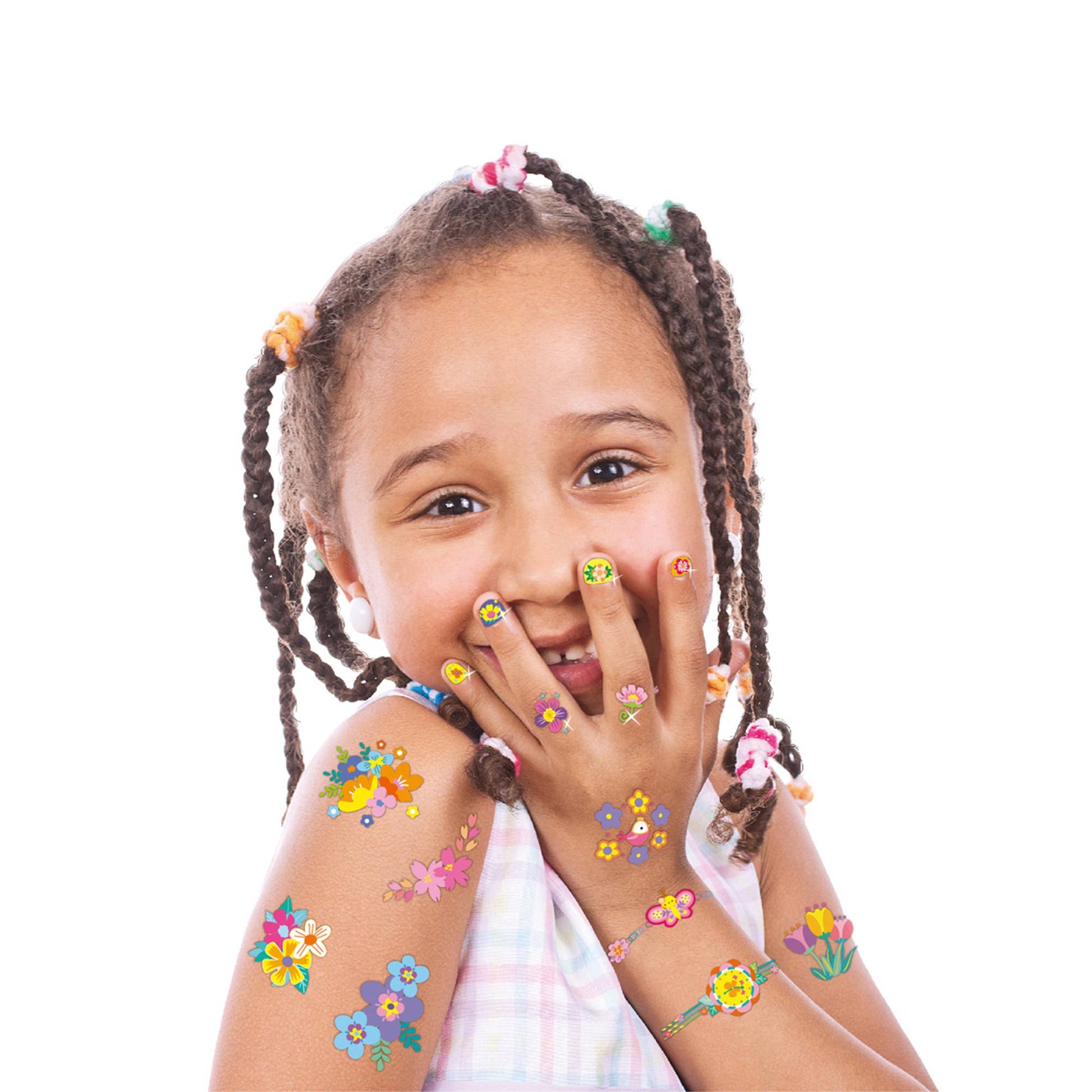 Smiling girl with braided hair wears a sleeveless top and proudly shows off Nail Stickers And Tattoos FLOWER on her face, arms, and hands against a white background.