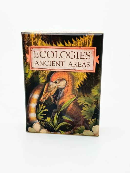 Ecologies: Ancient Areas is a card game box featuring an illustration of a prehistoric bird-like creature amid lush green foliage and ferns, inviting players to explore extinct ecosystems in this captivating scientific board game.
