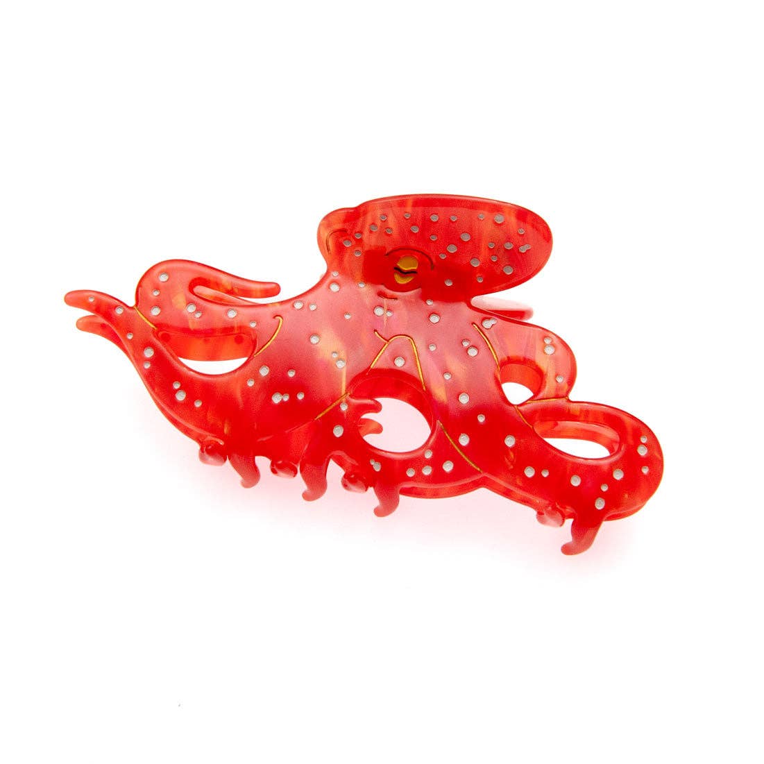 Translucent red Octopus Claw Clip with white polka dot patterns.