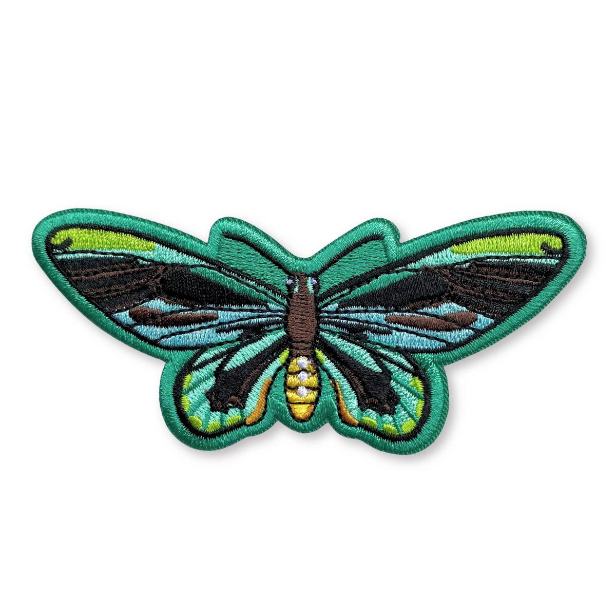 Queen Alexandra’s Birdwing Butterfly Iron-On Embroidered Patch featuring bright green, light blue, and black wings with a brown and yellow body.