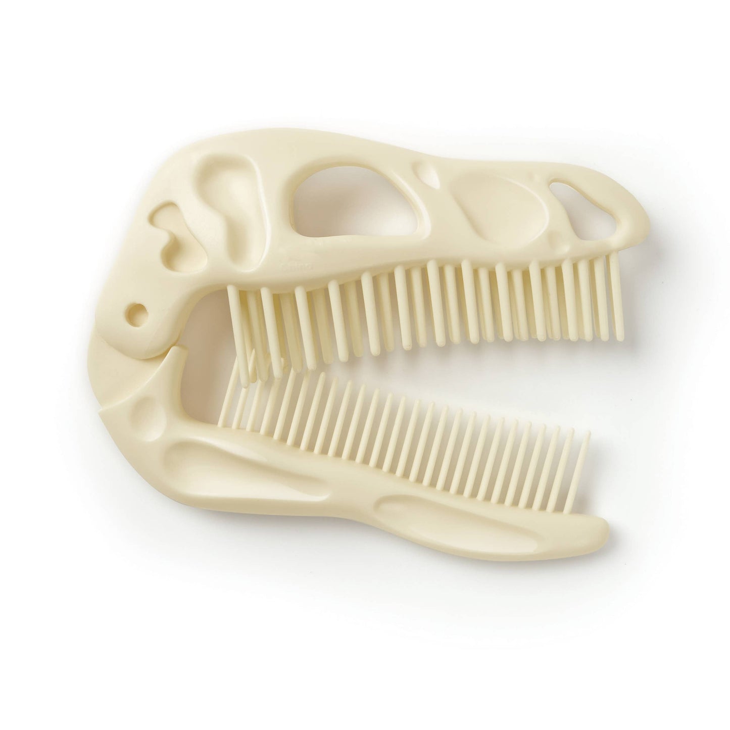 Beige dinosaur-shaped dual comb and brush 