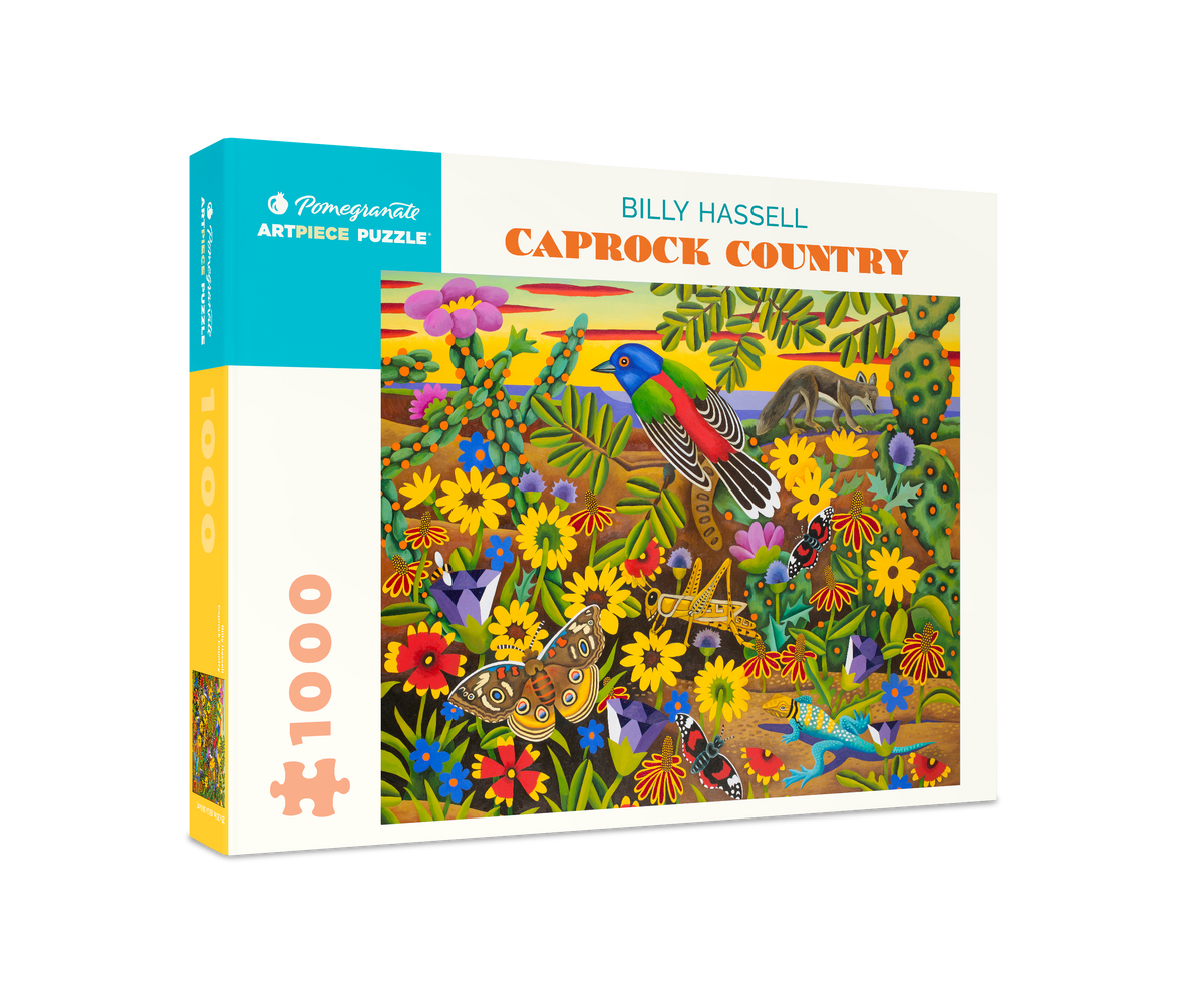 The Billy Hassell: Caprock Country 1000-Piece Jigsaw Puzzle box, featuring a colorful painting of a bird, butterflies, a lizard, and a coyote in a desert landscape filled with wildflowers and cacti.