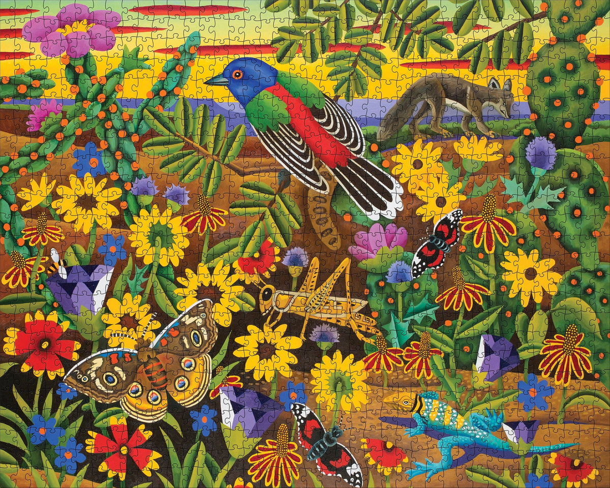 Billy Hassell: Caprock Country 1000-Piece Jigsaw Puzzle featuring a colorful West Texas illustration filled with desert flowers, a blue and red bird, a fox, a grasshopper, butterflies, and a lizard.