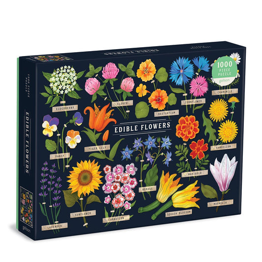 The Edible Flowers 1000 Piece Puzzle showcases vibrant illustrations and names of blooms such as elderberry, nasturtium, and lavender, all set against a striking dark background.