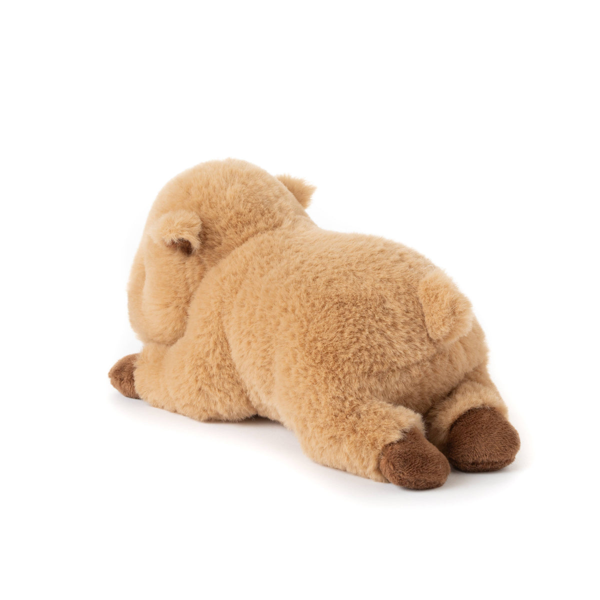 The Scoopz Capybara Small 8″ (21cm) is a plush stuffed animal featuring tan fur with brown feet, shown lying on its stomach with its back and tail visible—ideal for safari-themed nursery decor.