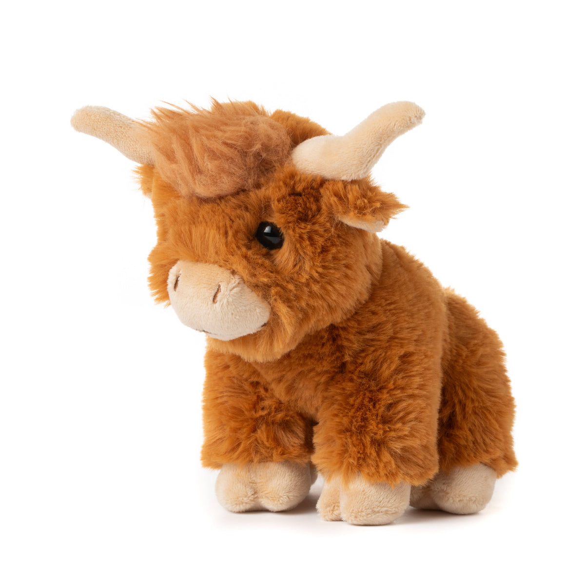 The Wild Onez Highland Cow 6″ (15cm) features soft brown fur, cream-colored horns, and black button eyes, sitting upright on a white background—perfect as a charming sensory toy or cozy farmhouse nursery decor.
