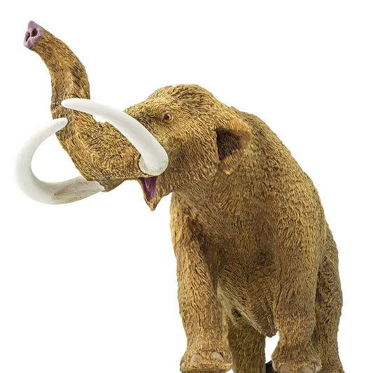 A detailed model of the American Mastodon toy stands with its trunk raised and mouth open, displaying long curved tusks and brown fur, set against a white background.
