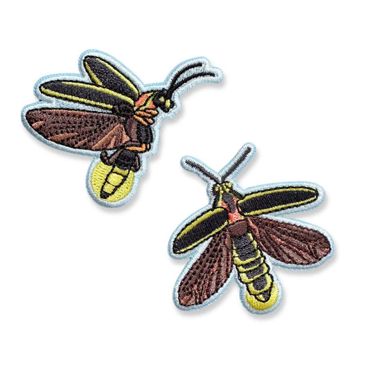 Two Common Eastern Firefly Iron-On Embroidered Patches, one shown in profile and one from above, featuring black, brown, and yellow thread.