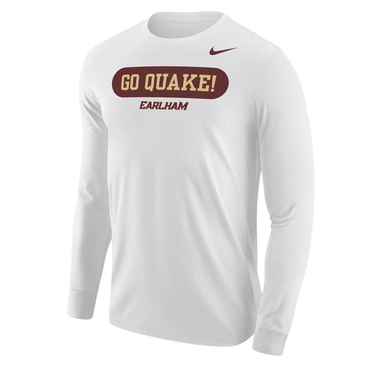 The Nike Long Sleeve Quake Tee is a white shirt featuring “GO QUAKE!” in gold letters on a maroon oval with “EARLHAM” printed underneath. The maroon Nike logo appears on the upper right shoulder.