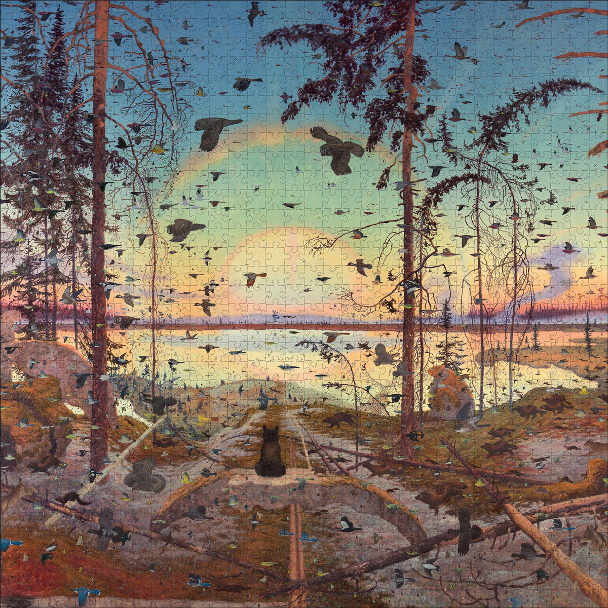 The Tom Uttech: Enassamishhinjijweian 1000pc puzzle depicts a landscape of a lake at sunset with a central sun halo, a dense flock of birds in flight, and a small bear sitting on a path in the foreground.