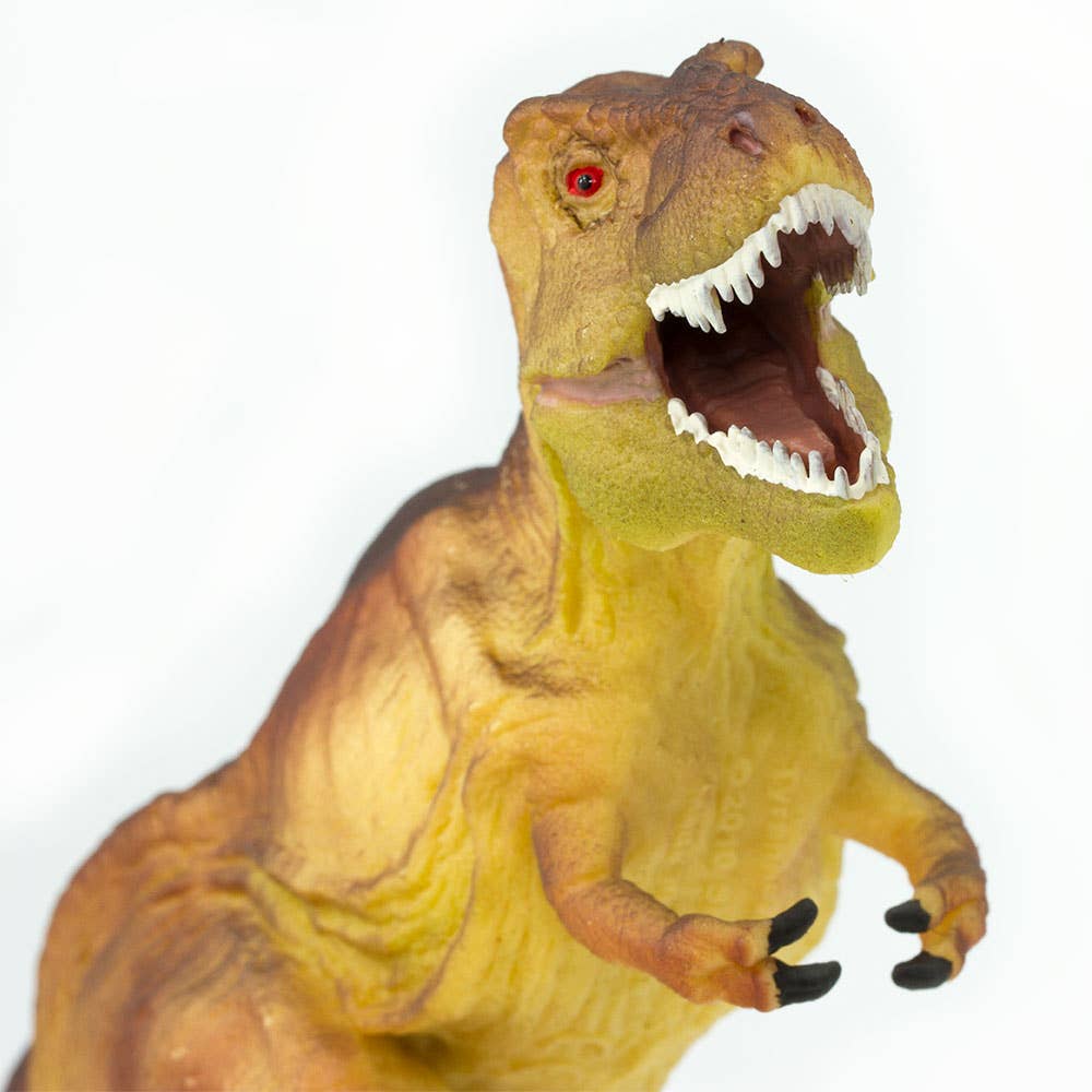 A close-up of the Tyrannosaurus Rex Kids' Figurine Toy with its mouth wide open, displaying sharp teeth and red eyes, set against a white background.