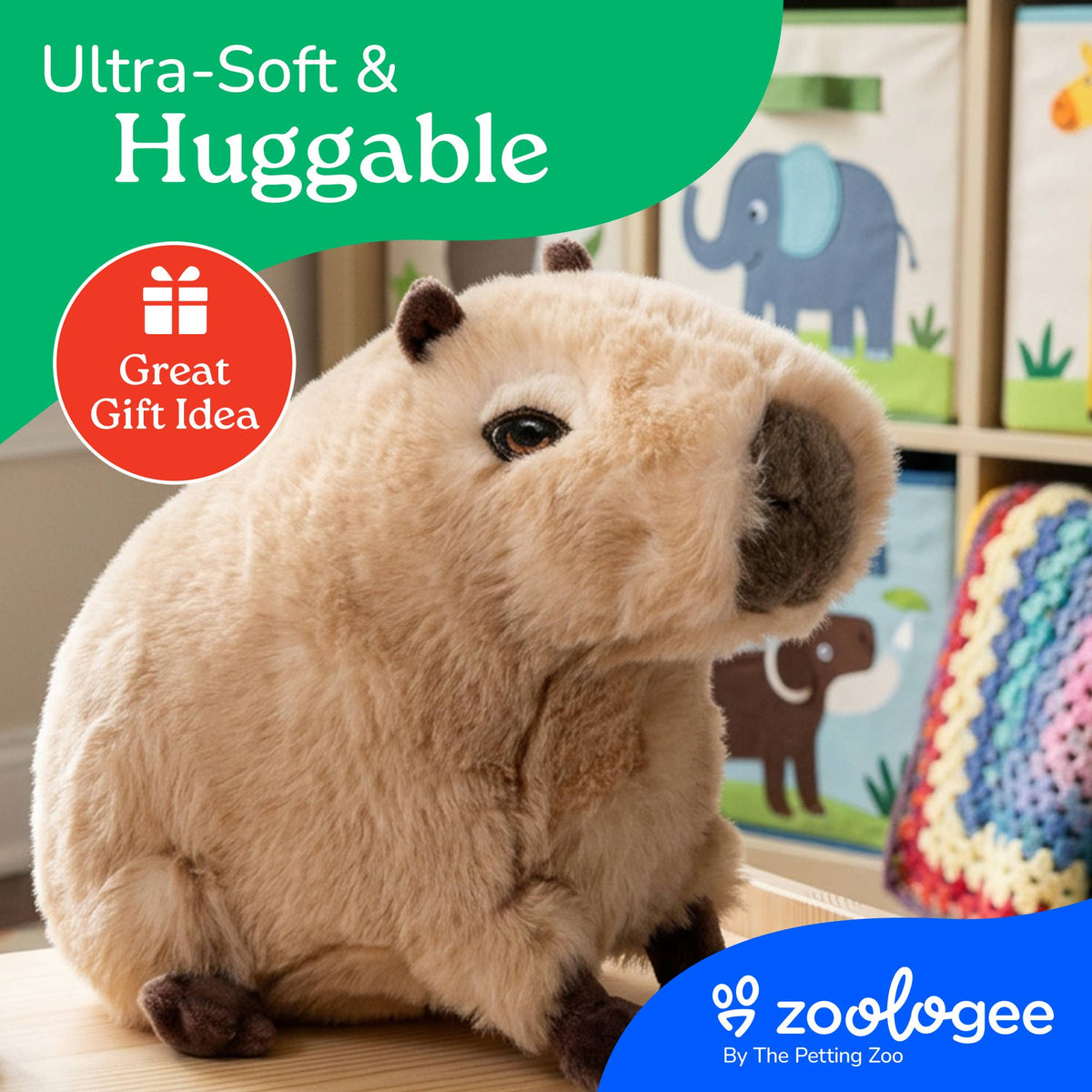 An Earth Keeperz Capybara small 10″ Recycled Plush sits on a table in a vibrant children’s room, with text calling it ultra-soft, huggable, and a perfect gift idea. This charming plush toy is made from recycled materials for an eco-friendly cuddle experience. The zoologee by The Petting Zoo logo appears at the bottom.