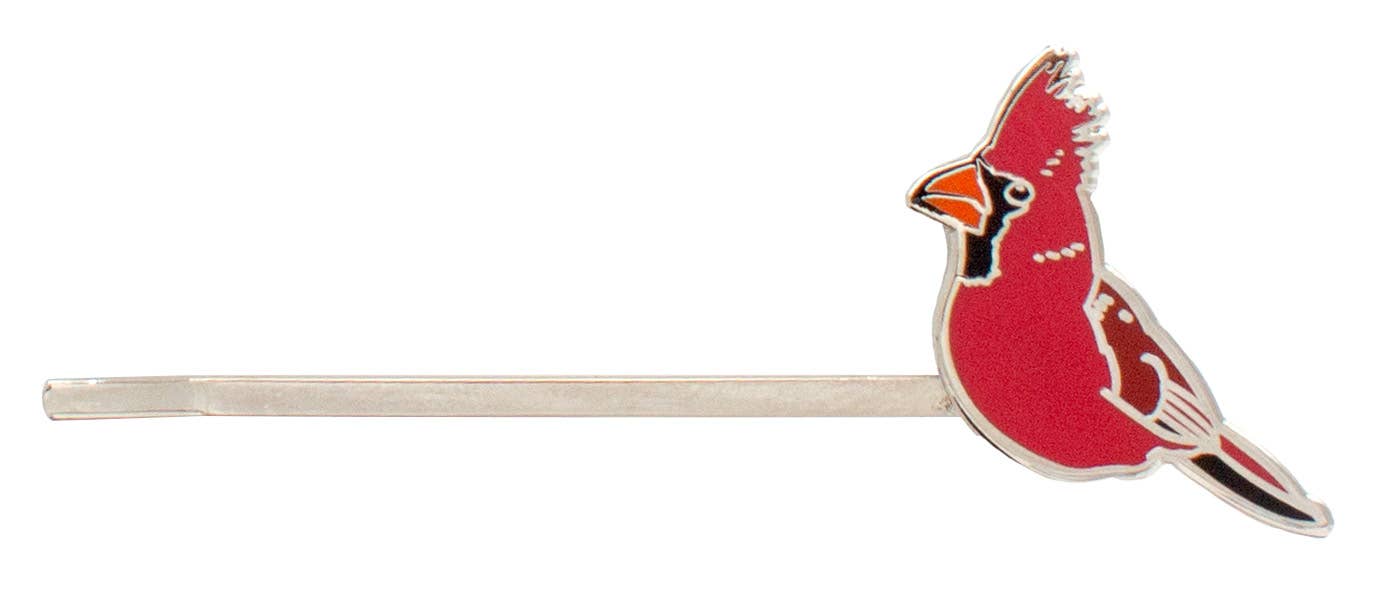 The Songbird Hair Pins feature a Northern Cardinal illustrated in profile, showing its crest, orange beak, and black face markings, attached to a sleek silver pin.