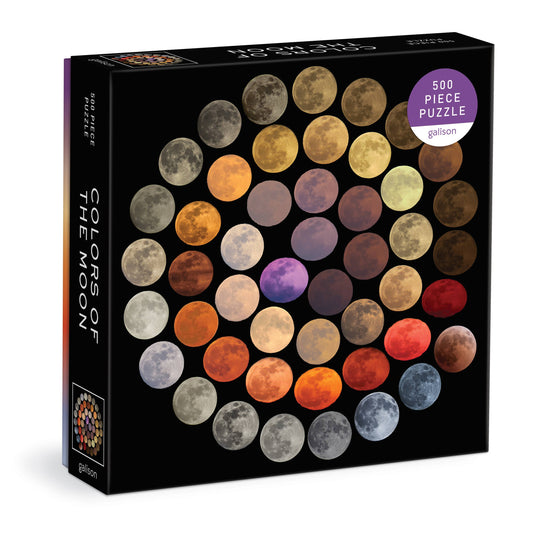The Colors of the Moon 500 Piece Puzzle showcases a grid of moon photos in different colors and phases against a black background, with the Galison logo on the front of this distinctive jigsaw.