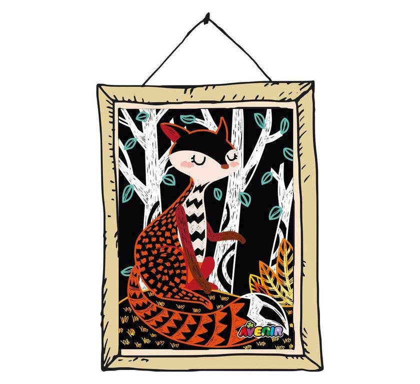 The Scratch Art 4 MAGIC ANIMALS kit features a framed fox with closed eyes, patterned fur, and a bushy tail sitting among white trees with green leaves on a black background, creating a calm and enchanting scene.