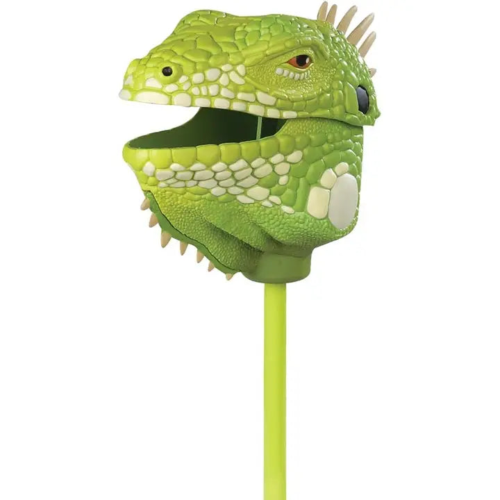Introducing the Pincher Iguana: a green toy puppet designed as an iguana head with an open mouth, featuring white and yellow spots and a convenient handle below for easy operation.