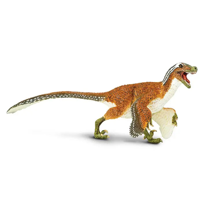 A Velociraptor (feathered) model with an open mouth, orange and white body, green legs, and outstretched arms, standing on a white background.