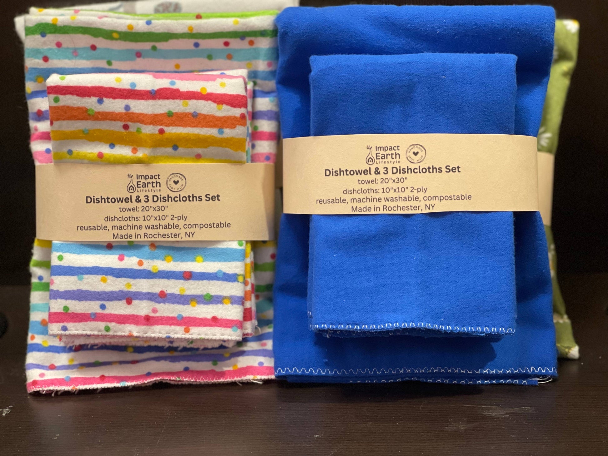 The Dishtowel & 3 Dishcloth Set–Compostable comes in two designs: one with colorful stripes and dots, the other in solid blue. Both are compostable, machine washable, and made in Rochester, NY.